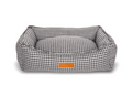 Ralph & Co Kensington luxury houndstooth bolster nest dog bed with plush cushioning and supportive raised edges.