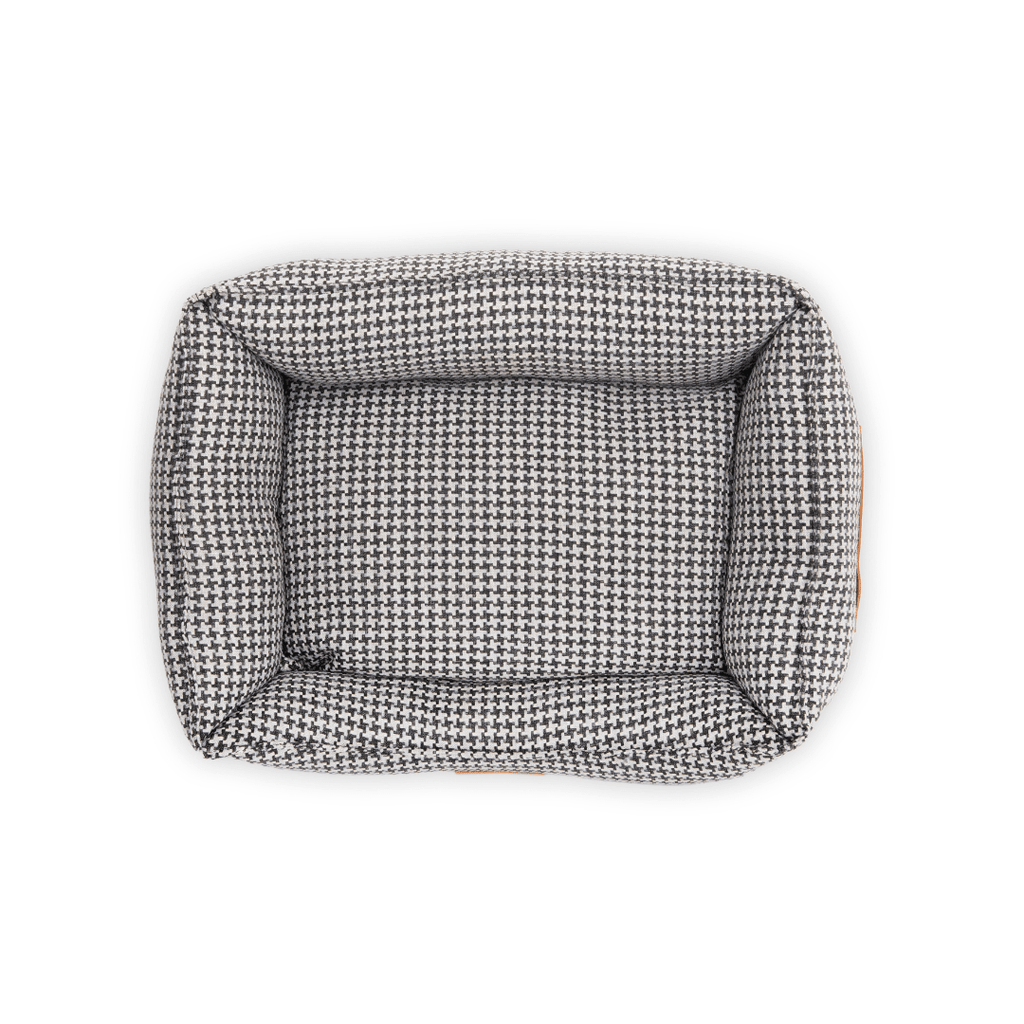 Ralph & Co Kensington luxury houndstooth bolster nest dog bed with plush cushioning and raised sides for comfort.