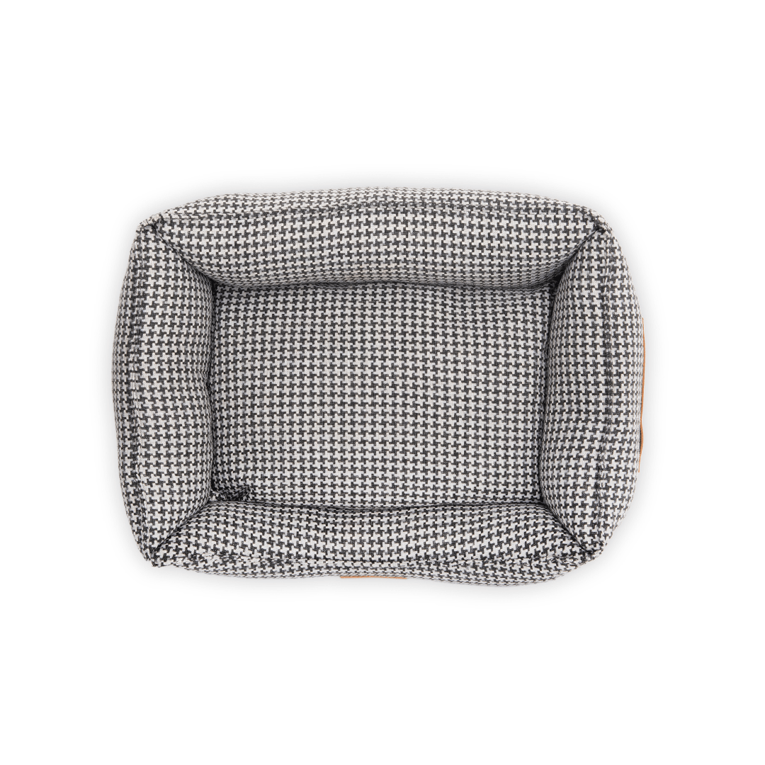Ralph & Co Kensington luxury houndstooth bolster nest dog bed with plush cushioning and raised sides for comfort.